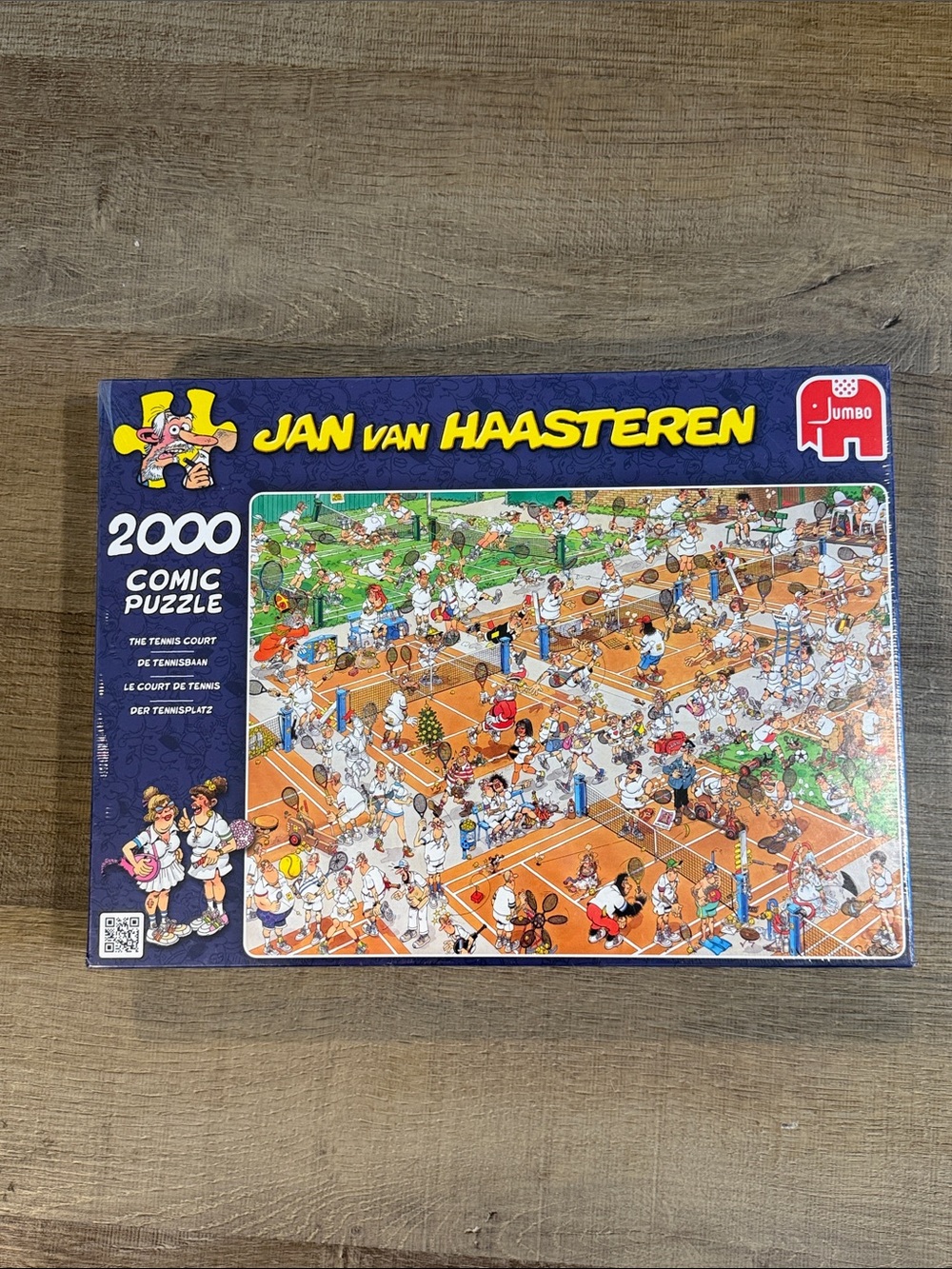 Jumbo comic puzzle 2000-piece titled "The Tennis Court" Jan van Haasteren NEW
